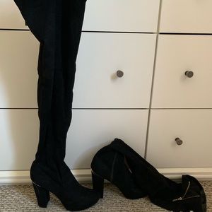 Thigh high, high heeled boots